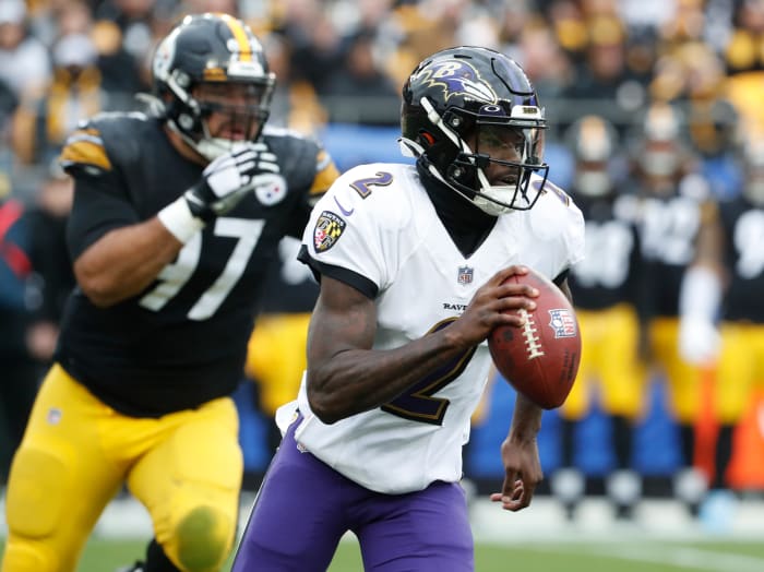 Baltimore Ravens quarterback Tyler Huntley (2) scrambles with the ball against the Pittsburgh Steelers during the first quarter at Acrisure Stadium. Mandatory Credit: Charles LeClaire-USA TODAY Sports